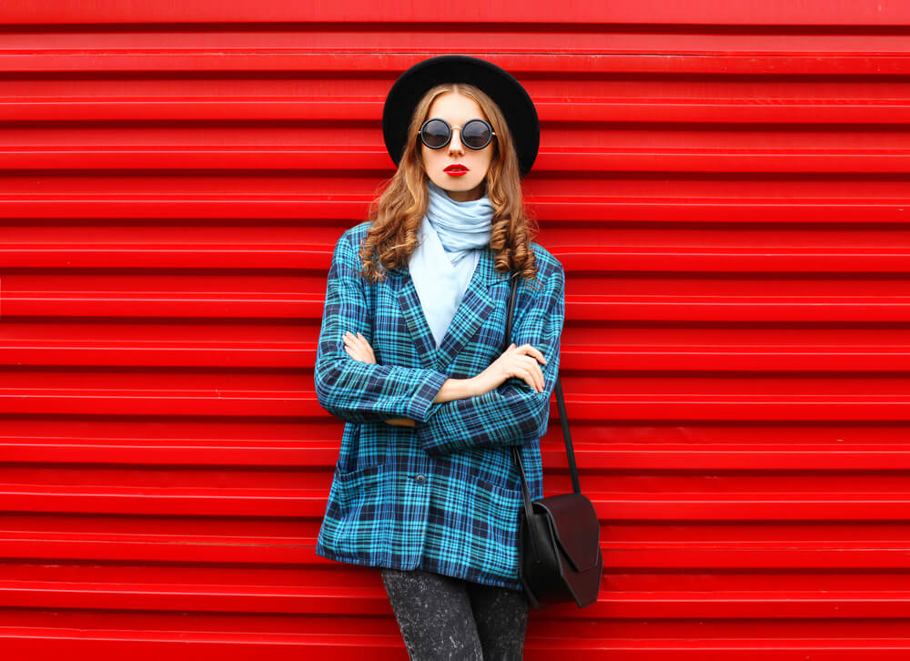 woman in blue checkered coat