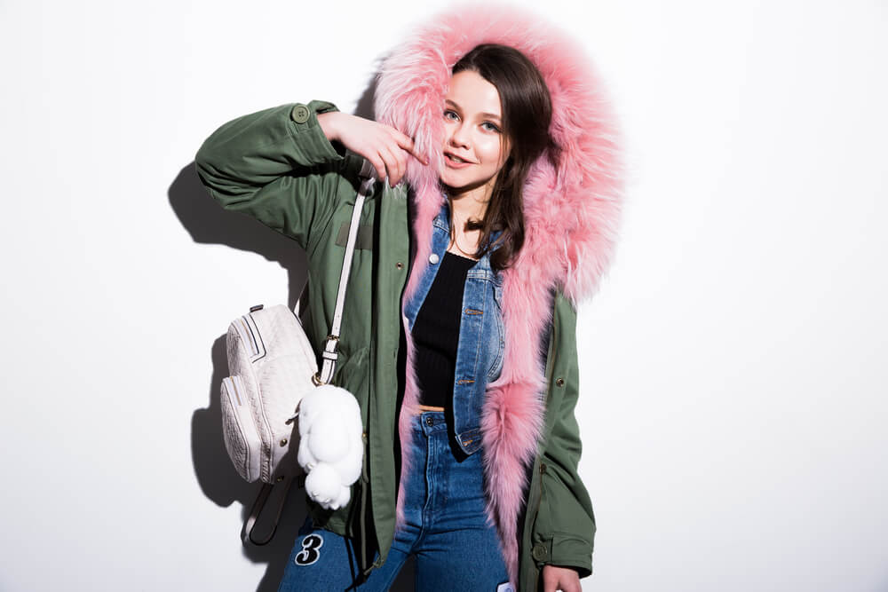 woman in pink furry parka