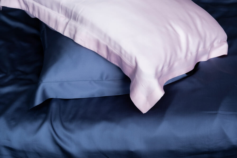 Silk pillowcases on bed