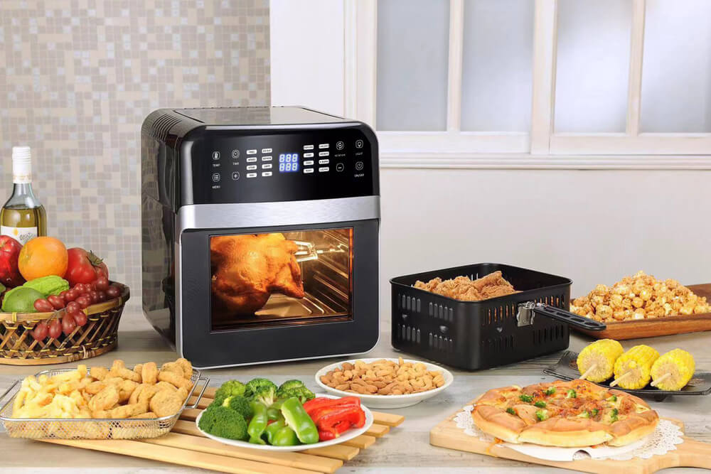 Air fryer on table with food