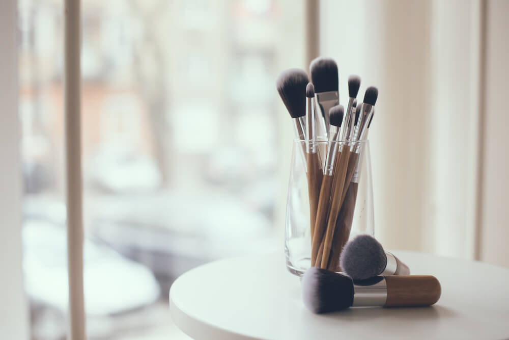 Makeup brushes in glass