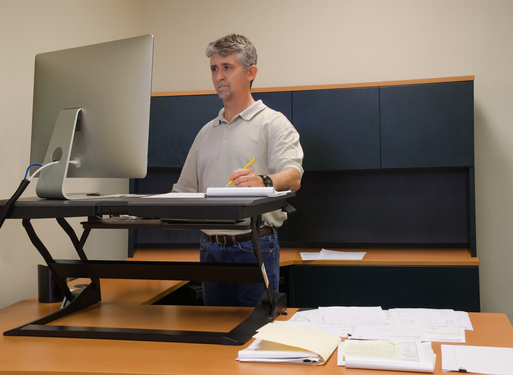 Man standing at desk