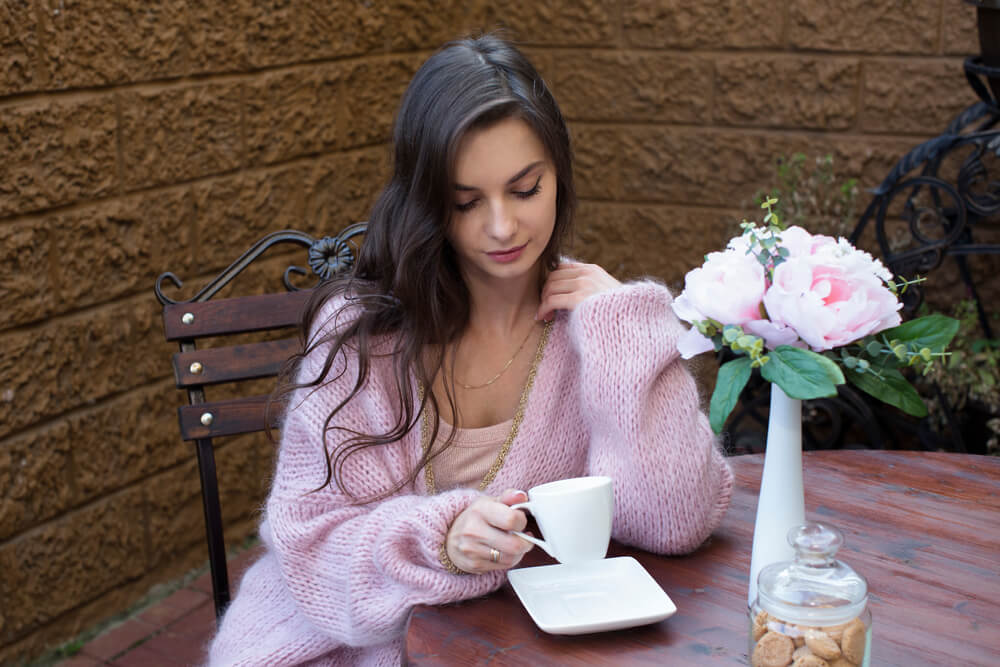 Woman wearing chunky sweater