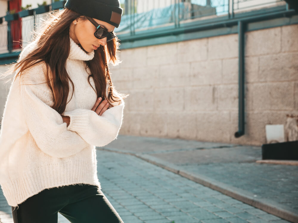 Woman wearing chunky sweater