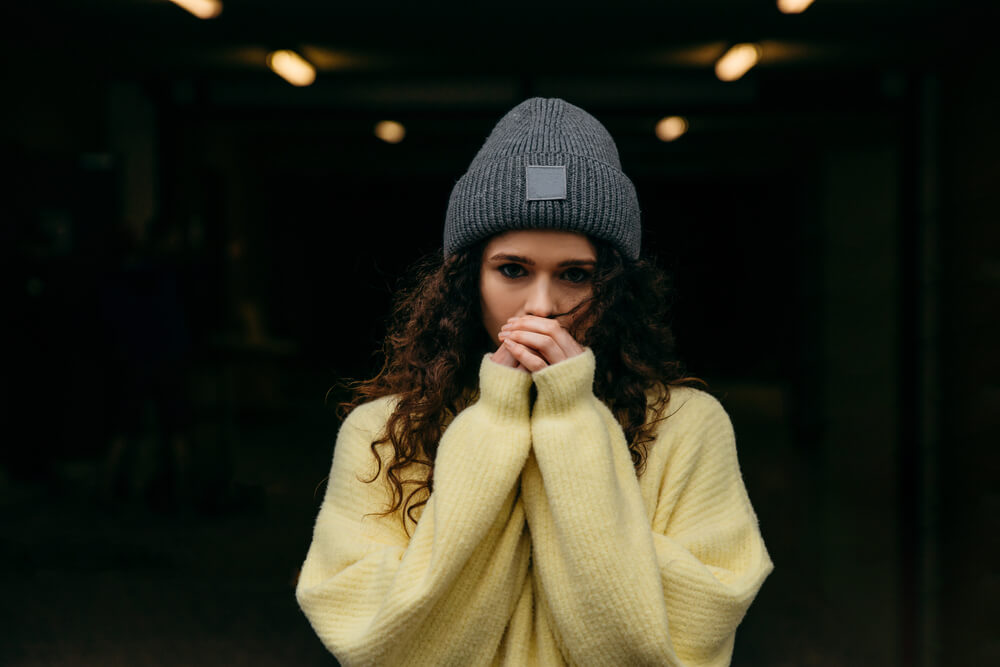 Woman wearing chunky sweater