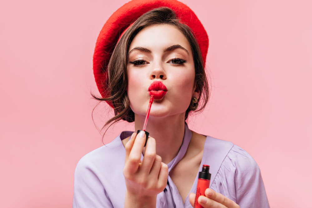 woman doing makeup