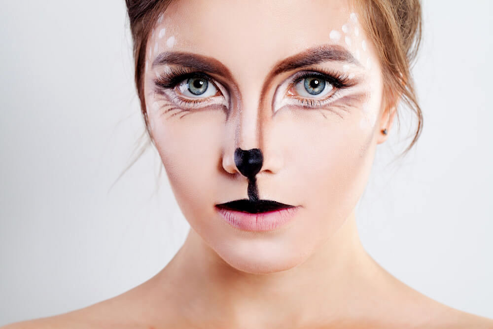 Pretty woman with deer makeup
