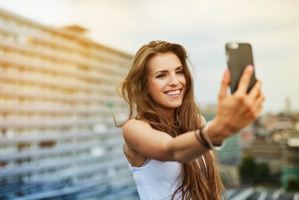 Woman taking selfie